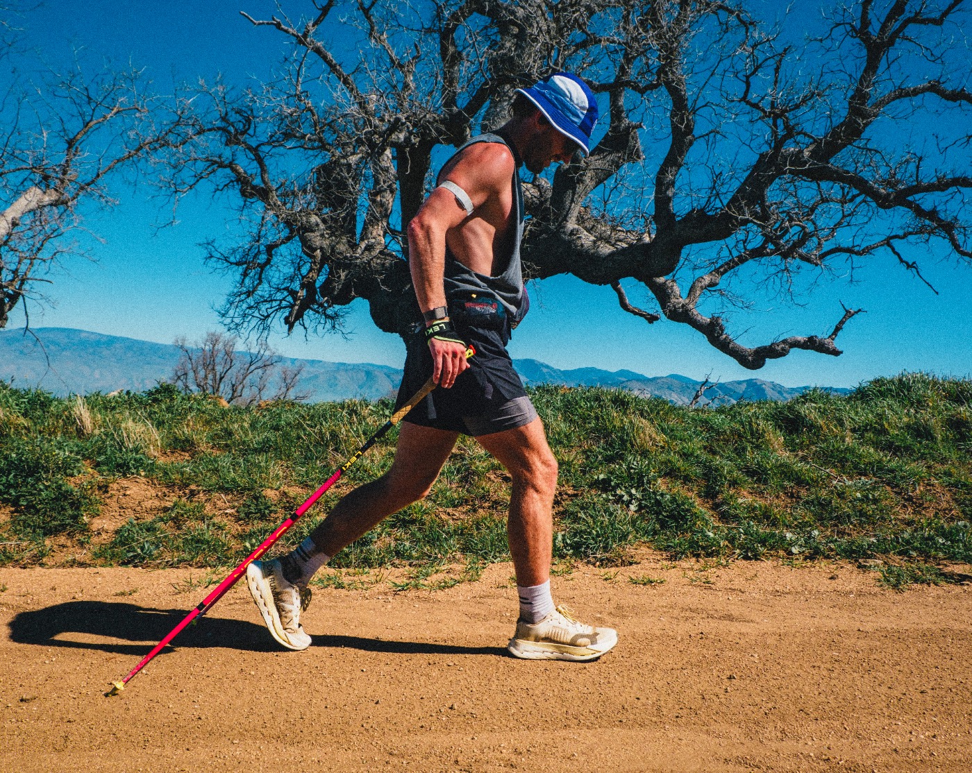 Mason Newberry hiking with poles